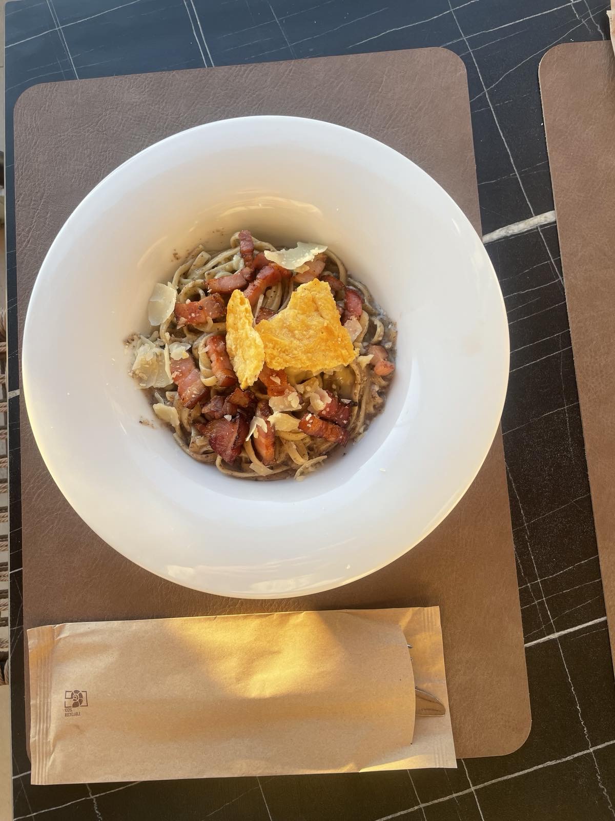 Truffle linguine with bacon and parmesan at Tramonto Lounge